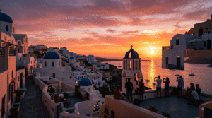 romantic sunset scene in Oia, Santorini, Greece, silhouettes of traditional whitewashed buildings and blue-domed churches