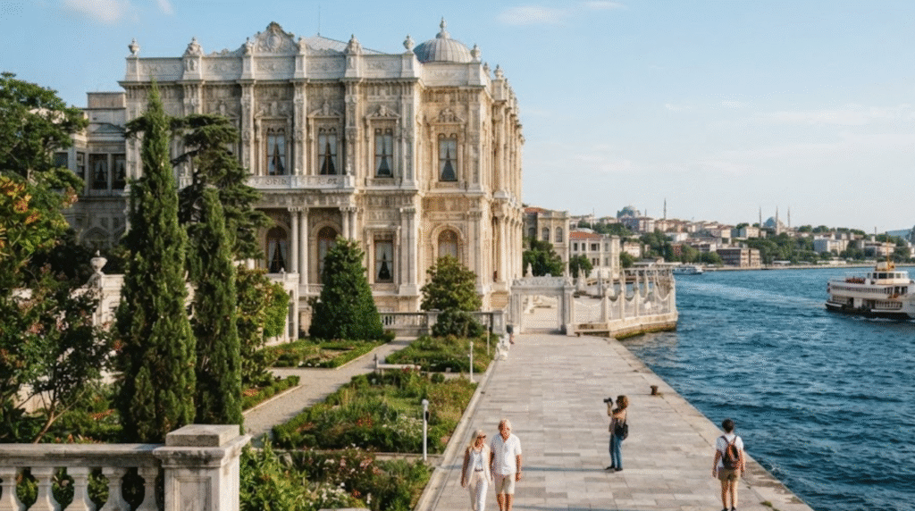 waterfront architectural photograph of Dolmabahçe Palace in Istanbul, Turkey, magnificent ornate palace façade directly beside the Bosphorus