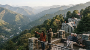 photograph of Mussoorie, Uttarakhand, featuring a scenic mountain viewpoint overlooking layers of Himalayan hills and a lush green valley