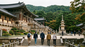 travel photograph of random visitors exploring Bulguksa Temple in Gyeongju, traditional Korean Buddhist architecture, stone stairways, pagodas,