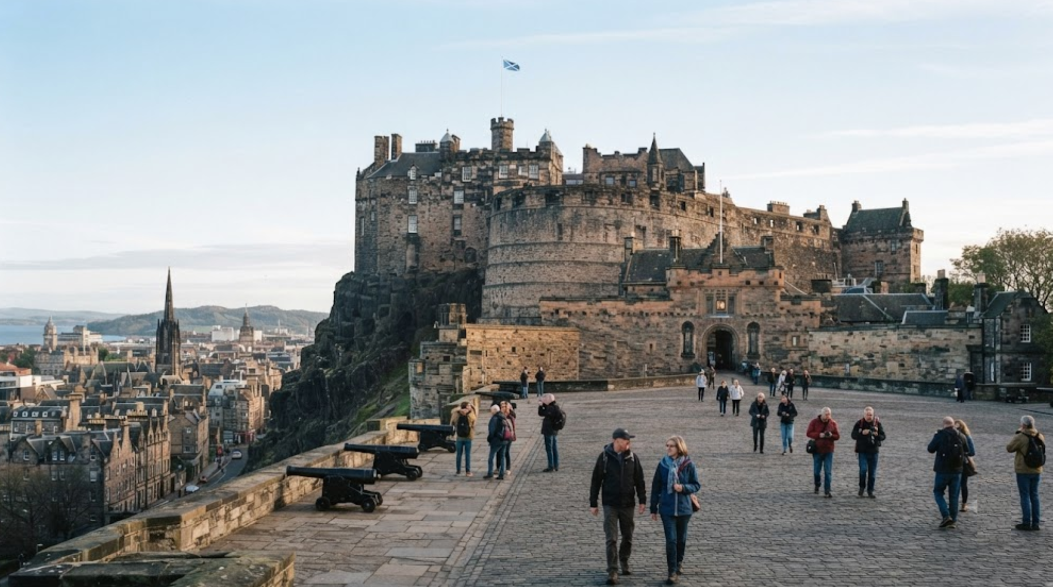 Edinburgh Castle in Scotland on a crisp clear morning, historic stone fortress dramatically positioned on Castle Rock,