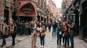 travel photograph of random international music tourists exploring a historic Beatles-related street and music heritage location in Liverpool