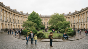 The Circus in Bath, England, elegant circular Georgian terraces made from warm honey-colored Bath stone, central green space