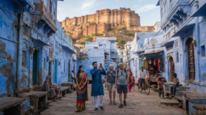 travel photograph of random diverse Indian tourists walking through the historic blue-painted neighbourhoods of Jodhpur, Rajasthan